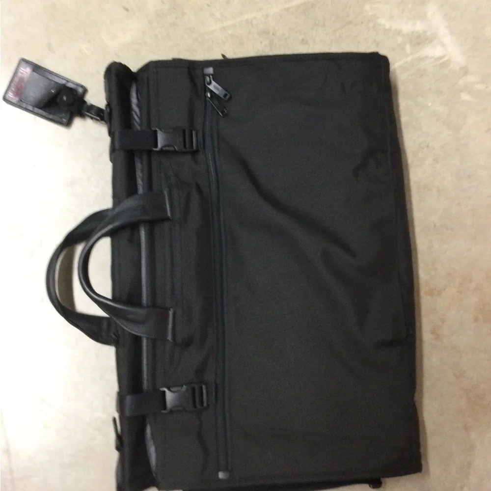 Tumi Black Men's Travel Duffel with Front Zip Pocket and Carry Handles